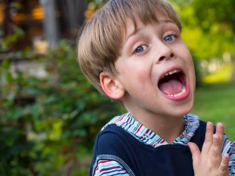 Boy in the park, sunny day Stock Photos
