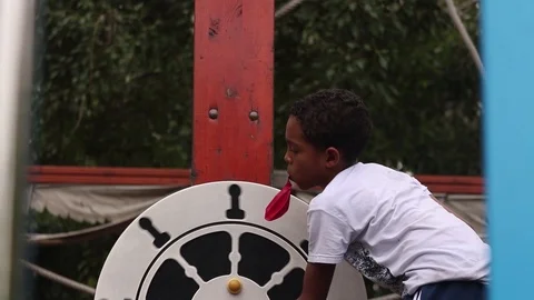 Boy at park working out with a Tai Chi spinner Stock Footage 101721568