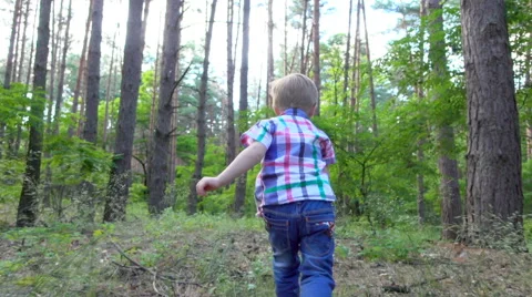 Boy pathway running slowly Stock Footage 64260375