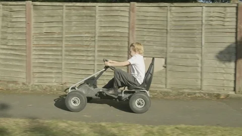 Boy on pedal kart 스톡 동영상 116357769