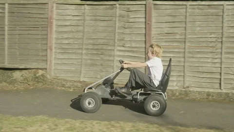 Boy on pedal kart Video stock 117209804