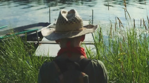 Boy On A Pier With Dog Stock-Footage 78675057