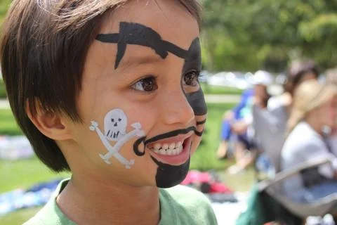 Boy with Pirate Face Paint - Side View Stock Photos