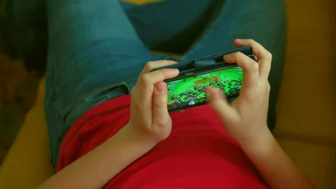 Boy play with his cell Video stock 88459700