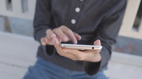 Boy play a smartphone Stock-Footage 102648483