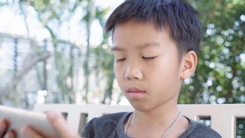 Boy play a smartphone Stock-Footage 102648627