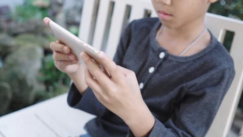 Boy play a smartphone Stock-Footage 103970913