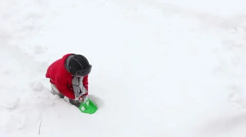 Boy play in snow Stock Footage 10766381
