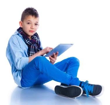 Boy play with tablet Stock-Fotos