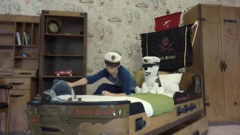 The boy is played by a dog. Video stock 84264875