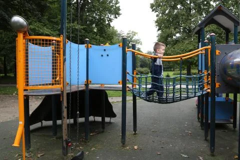 Boy on a playground Stock Photos