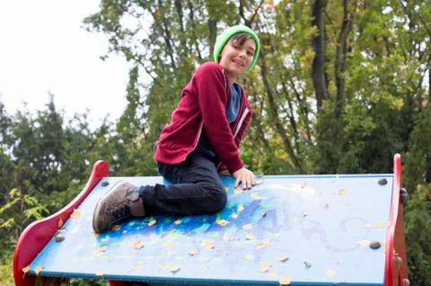Boy on playground 写真素材