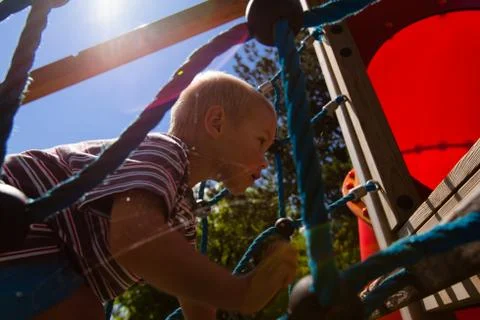 The boy on the playground. Stock Photos