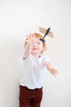Boy playing with airplane Stock Photos