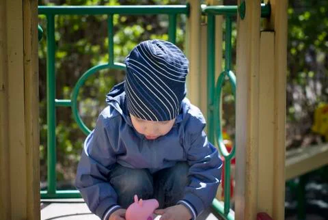 Boy Playing Alone Photos