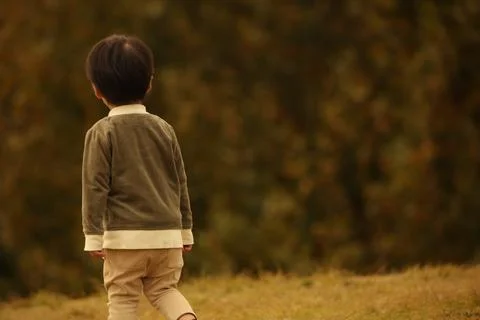 Boy playing alone Foto stock