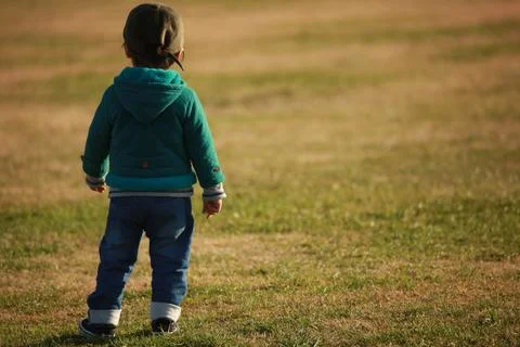 Boy playing alone Stock Photos