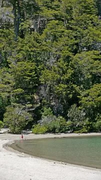 A boy playing on Baha Brava beach, Nahuel Huapi Lake, Villa la Angostura Stock-Fotos