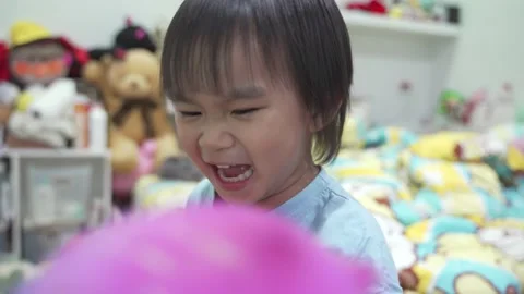 Boy playing with balloons Stock Footage 189975367