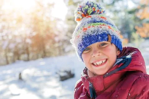 Boy playing in big snow in winter. Stock-Fotos