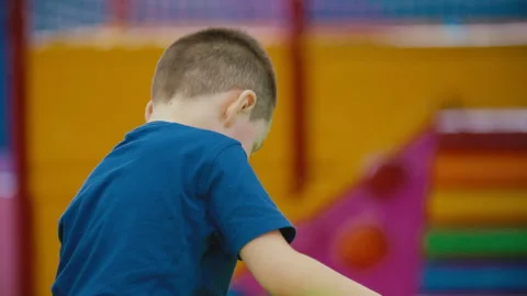 Boy playing board game Stock Footage 106810853