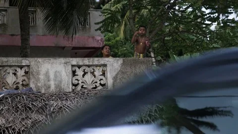 Boy playing with bubble wand Stock Footage 71760852