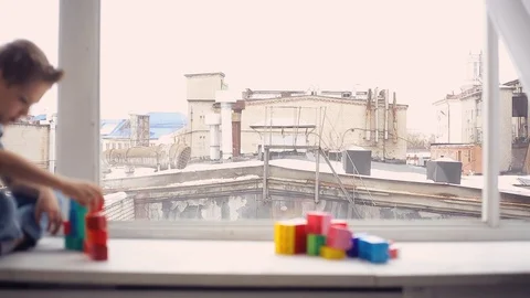 Boy playing with building blocks toy Video stock 103030128