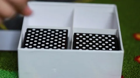 Boy playing with cards in box Stock Footage 88995207