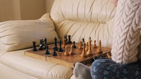 A boy playing chess with himself Video stock 150384872