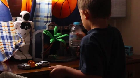Boy playing in the children's room Stock Footage 65300429