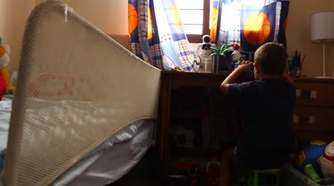 Boy playing in the children's room Stock Footage 65300431