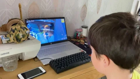 Boy playing computer game Stock Footage 173729652