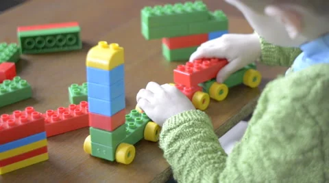 Boy playing constructor Stock Footage 60835325