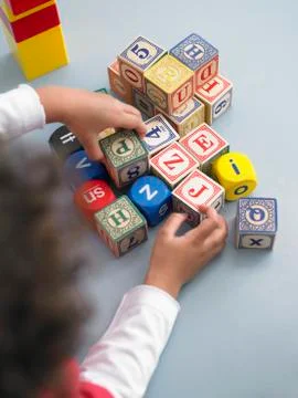 Boy Playing With Cubes Stock Photos