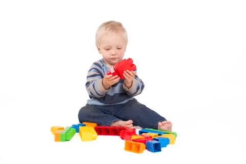 Boy playing with cubes Stock Photos