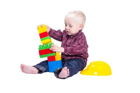 Boy playing with cubes Stock Photos