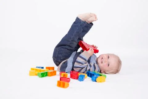 Boy playing with cubes Stock Photos
