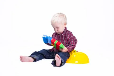 Boy playing with cubes Stock Photos