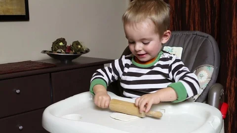 Boy playing with dough 스톡 동영상 100467975