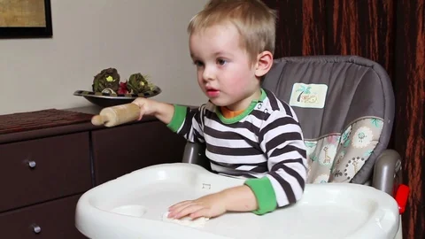 Boy playing with dough 스톡 동영상 100468009