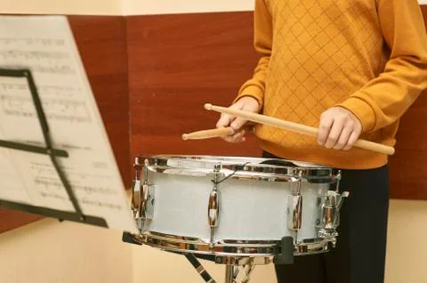 Boy playing drum Stock Photos