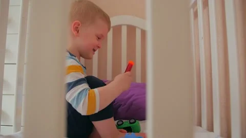 Boy Playing With Flashlight Stock Footage 151822254