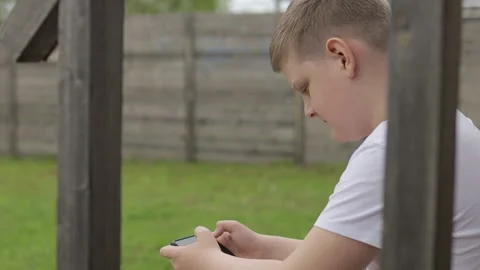 Boy playing Stock Footage 274938504