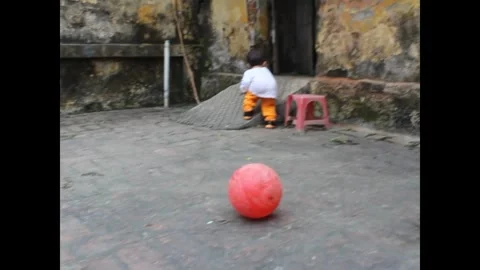 The boy playing Stock Footage 291378806