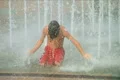 Boy Playing in Fountain Footage