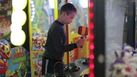 A boy playing a game on the game simulator Stock Footage 65114111
