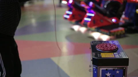 A boy playing a game on the game simulator Stock Footage 65563519