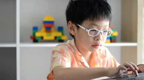 Boy playing games on computer. Video stock 52889107