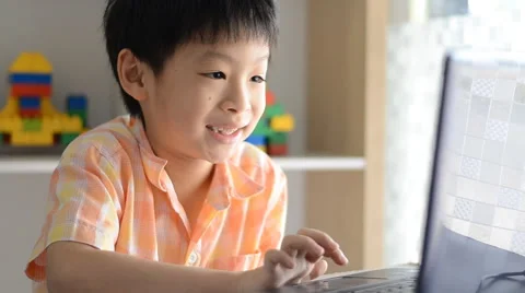 Boy playing games on computer. Stock Footage 52910445