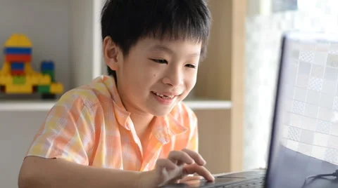 Boy playing games on computer. Stock Footage 52913377